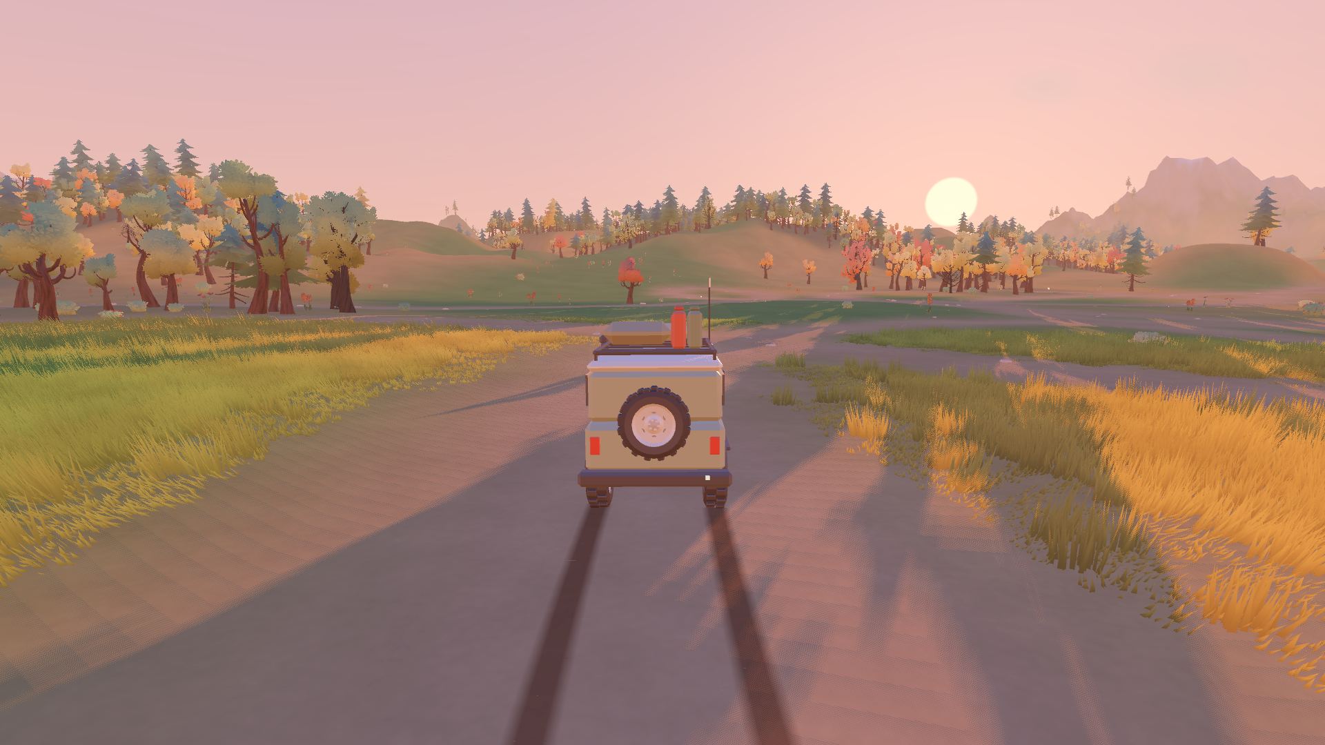 A cream off-road wagon on a dirt trail through a golden meadow at sunset, autumn trees behind.